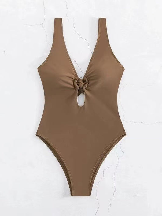 Women's lavender one-piece swimsuit with a deep V-neck, silver O-ring detail, and a keyhole cutout at the bust. - Image 13