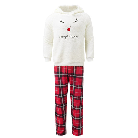 Family of four wearing matching cream fleece reindeer pajamas with red plaid pants, posing for a Christmas photo. - Image 3