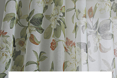 Dark gray semi-sheer curtains with a white and green floral pattern, hung on a black rod in a living room. - Image 8