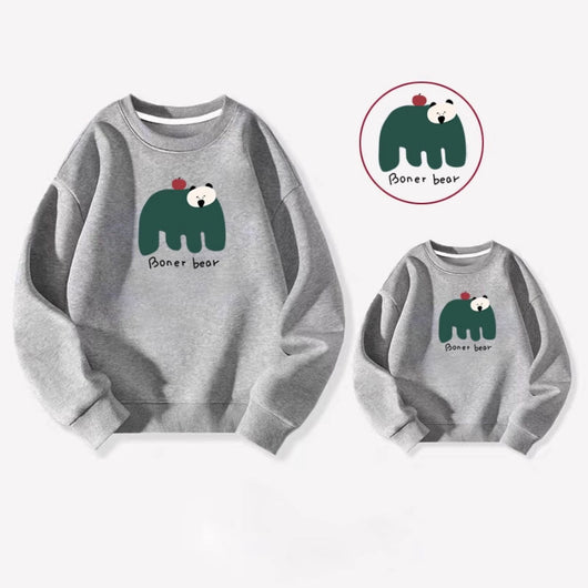 Matching cream crew neck sweatshirts, one adult and one child size, with a dark green bear graphic and "Boner bear" text. - Image 3