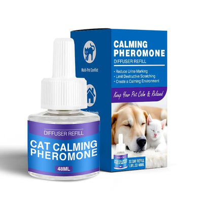 Cat Calming Pheromone Diffuser Kit with a white plug-in diffuser and a green refill bottle, next to its green and white box. - Image 8