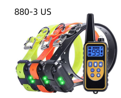 Three electric dog training collars in black, orange, and yellow with receivers, alongside a black and yellow remote control. - Image 24