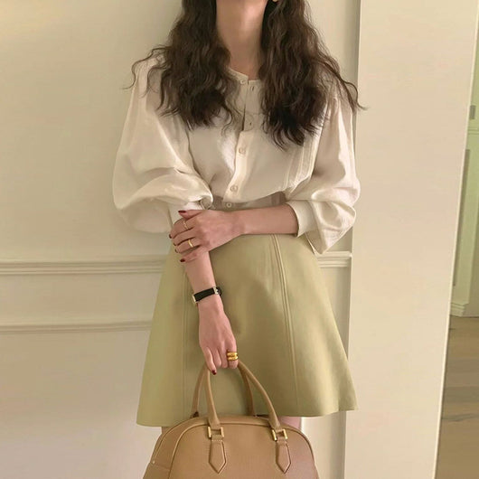 Conjunto Falda A-línea Cintura Alta con Blusa Literaria Elegante