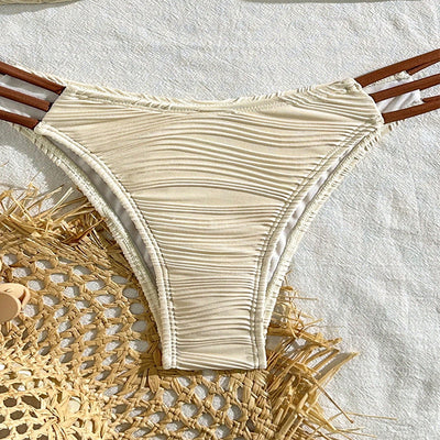 Neon green textured two-piece swimsuit with a bandeau top and high-cut bottom, featuring black straps and a gold clasp. - Image 15