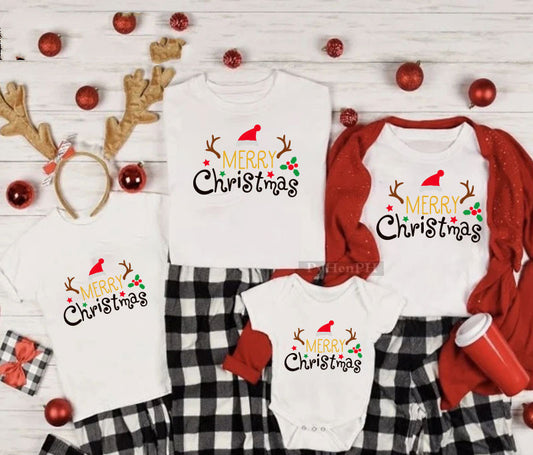 Family matching white Christmas t-shirts and baby bodysuit with 'Merry Christmas' graphic, paired with black and white plaid pajama bottoms. - Image 2