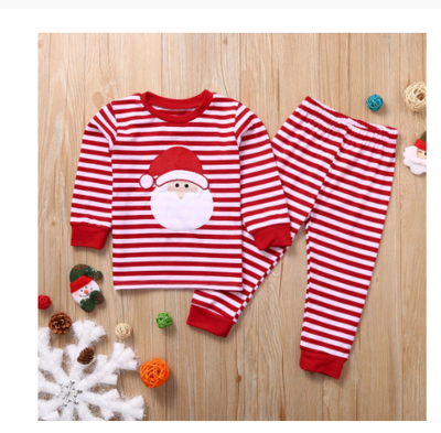 Red and white Christmas pajama set with a long-sleeve top featuring 'Merry Christmas' text and reindeer antlers, paired with striped pants. - Image 8