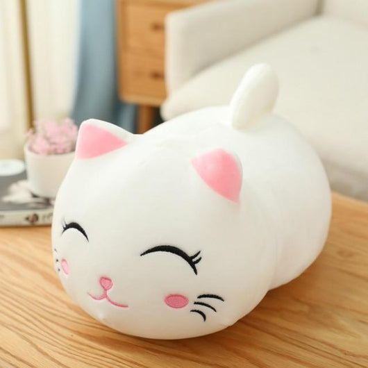 Cute orange cat plush doll with pink ears, black eyes, and embroidered whiskers, resting on a white book. - Image 28