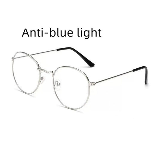Retro oval anti-blue light glasses with a dark metal frame and clear lenses on a white background. - Image 7