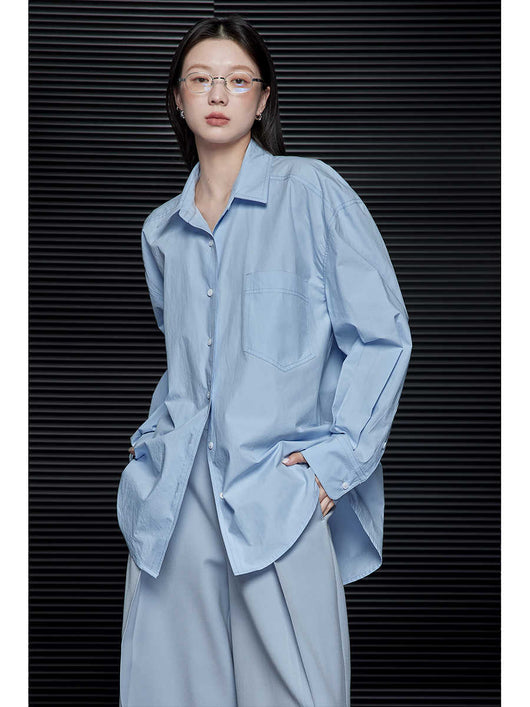 Blusa Minimalista Suelta Azul de Manga Larga para Mujer - Image 4