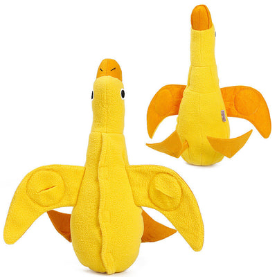 Golden retriever puppy biting a yellow plush duck dog toy with an orange beak and black eyes. - Image 8