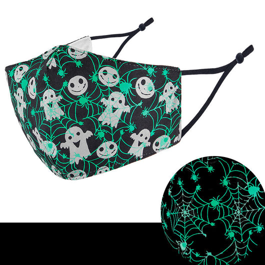 Black cloth face mask with white Halloween witch, bats, and jack-o'-lantern pattern, shown glowing green in the dark. - Image 4