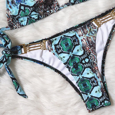 Women's snake print one-piece swimsuit with backless design, criss-cross straps, and a tie-front detail. - Image 15