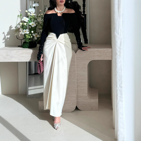 Vestido Elegante con Bloques de Color y Detalles de Perlas