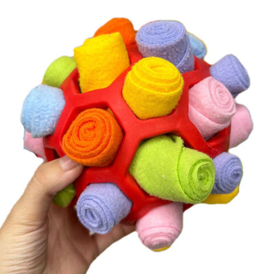 Red plastic pet sniffing mat dog toy with rolled fabric pieces in red, green, brown, and white. - Image 3
