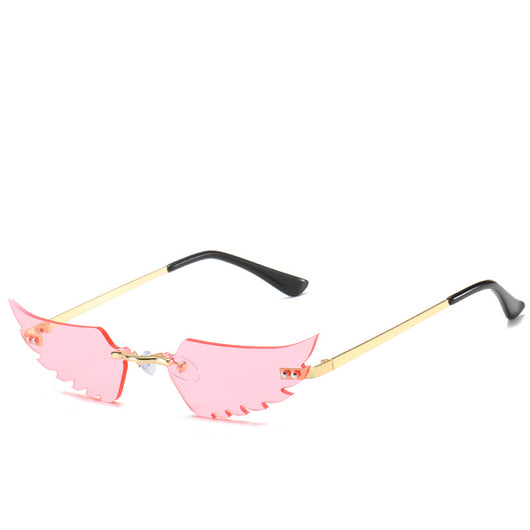 Purple wing-shaped rimless sunglasses with gold-colored metal arms and black ear tips on a white background. - Image 10