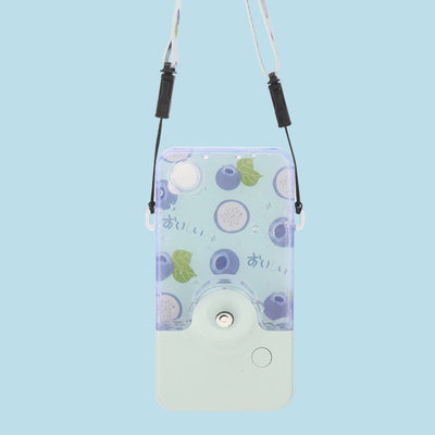 Pink and clear portable handheld humidifier with a fruit pattern, mist nozzle, and a matching pink neck lanyard. - Image 3