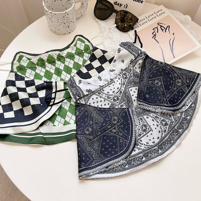 Female cream and black floral polka dot sun protection mask with ear loops, designed for eye corner protection. - Image 50