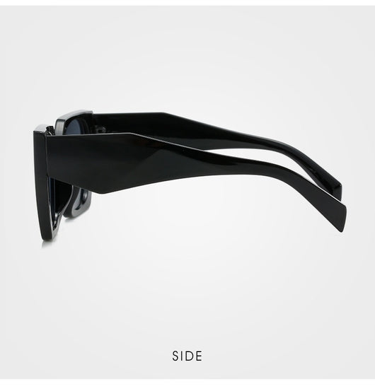 Retro cat-eye sunglasses with a vibrant orange frame, brown temples, and light champagne-colored lenses. - Image 10