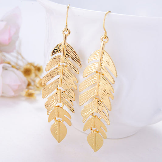 Aretes Largos de Borla y Hoja - Diseño Europeo Minimalista - Image 2