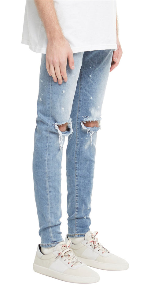 Jeans Slim Fit Azul con Corte en Rodilla y Diseño Spray Pintado - Image 14