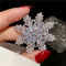Broche Copo de Nieve Multicapa de Circonia para Mujer