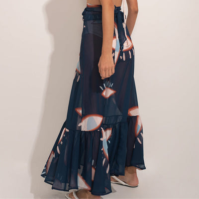 Navy blue mesh sarong with a white and red abstract eye pattern, featuring a tie-front waist and ruffled maxi hem. - Image 3