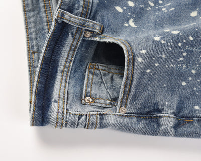 Jeans Azul Claro con Efecto Salpicado y Rotos Desgastados - Image 9
