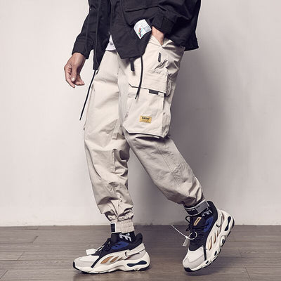 Pantalones cargo sueltos con cierres ajustables - Image 11