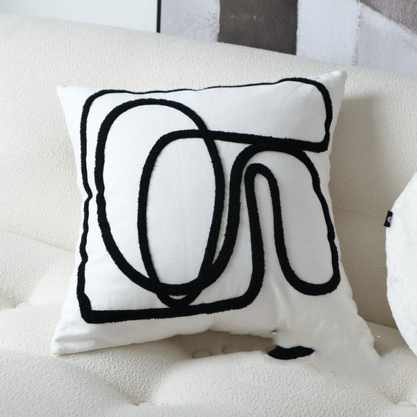 Almohada Decorativa Bordada con Líneas Geométricas Blancas y Negras