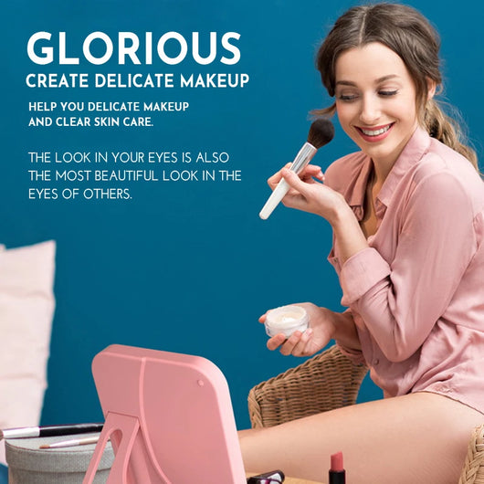 Pink LED makeup mirror with a rectangular shape, built-in lights, and a touch-sensitive power button. - Image 9
