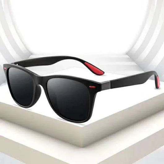 Black frame polarized sunglasses with blue mirrored lenses and blue and red accents on the temples. - Image 13