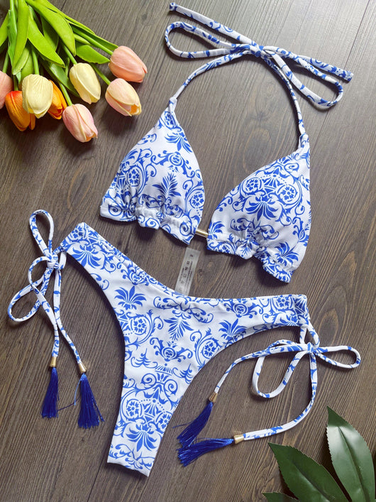 Women's blue and white porcelain print halter bikini with tie-side bottoms and blue tassels. - Image 22