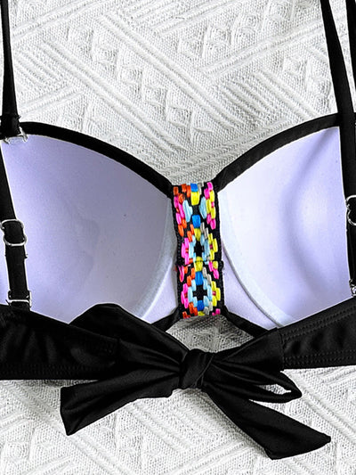 Black split bikini swimsuit for women with a bandeau top and high-cut bottom, featuring colorful geometric patterns. - Image 9