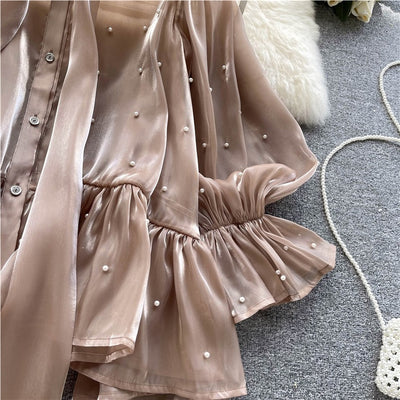Blusa Elegante con Mangas Acampanadas y Detalle de Moño en Perlas - Image 11
