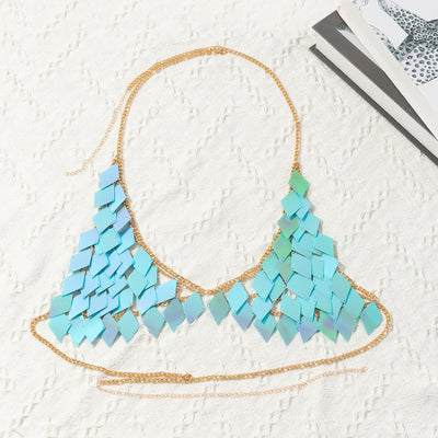 Woman wearing a gold-tone body chain top with iridescent pink and orange diamond-shaped sequins, perfect for beach or festival. - Image 53