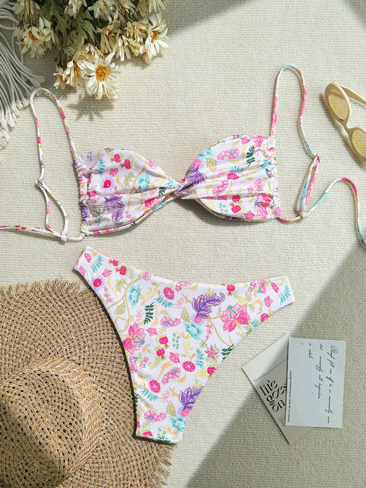 White ribbed two-piece bikini with colorful floral print, featuring a bandeau top and high-cut bottom. - Image 12