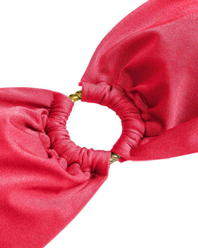 Red glitter bandeau bikini with gold-tone O-rings and side-tie bottoms on a model in a sunny outdoor setting. - Image 87