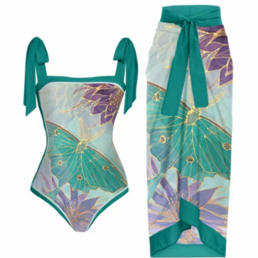 One-piece swimsuit with purple tie-shoulder straps, square neckline, and a teal butterfly and floral print. - Image 23