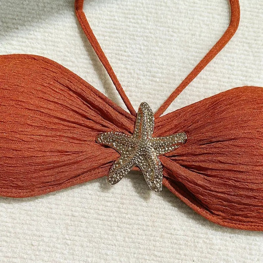 Rust three-piece swimsuit with textured fabric, featuring a tube top with a starfish, high-cut bottoms, and a sarong. - Image 12