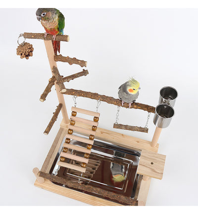 Multi-level natural wood parrot play stand with perches, ladder, swings, and two stainless steel feeding cups. - Image 21