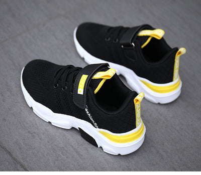 Boy's black and blue sports shoes with orange accents, mesh upper, white sole, blue laces, and a Velcro strap. - Image 26