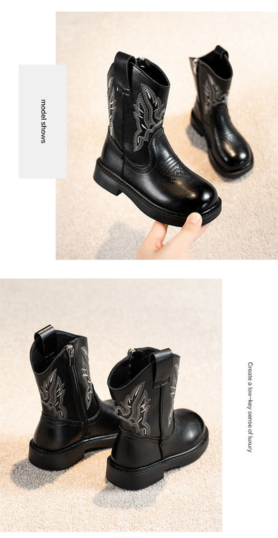 Girls' brown Martin boots with white ethnic embroidery, side zippers, and black soles, displayed on a light carpet. - Image 21