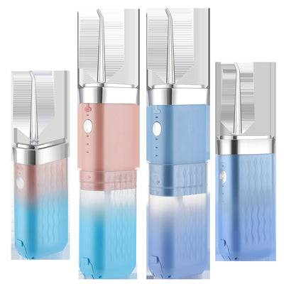 Portable water flosser in gradient pink and blue with four nozzles, a charging cable, and its product box. - Image 22