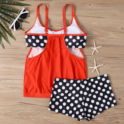 Women's two-piece swimsuit with a turquoise tankini top and black boxer bottoms with turquoise polka dots. - Image 16