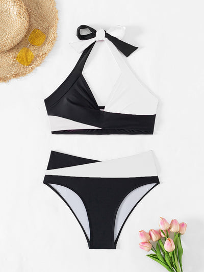 Black and white color-block halter bikini with high-waisted bottoms, modeled by a woman holding a straw hat. - Image 20