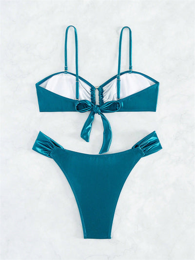 Solid black glossy two-piece bikini with a bandeau top featuring a ruched front and U-shaped detail, and high-cut ruched bottoms. - Image 17