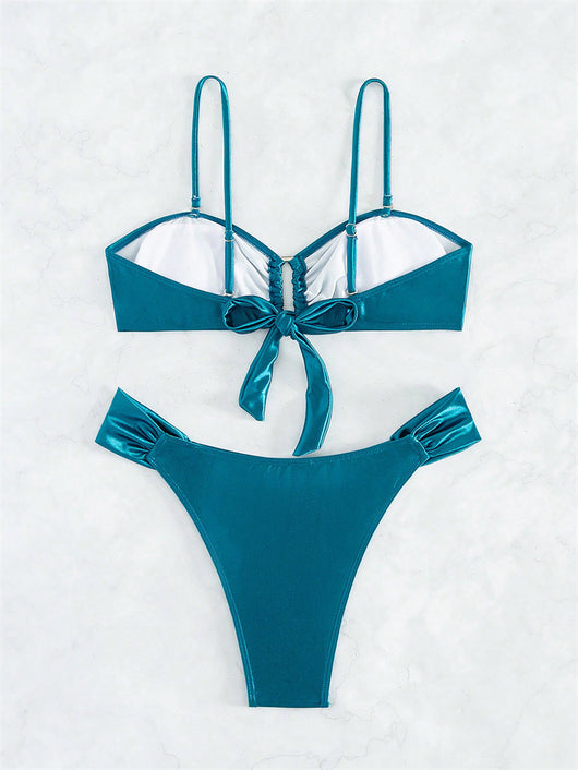 Solid black glossy two-piece bikini with a bandeau top featuring a ruched front and U-shaped detail, and high-cut ruched bottoms. - Image 17