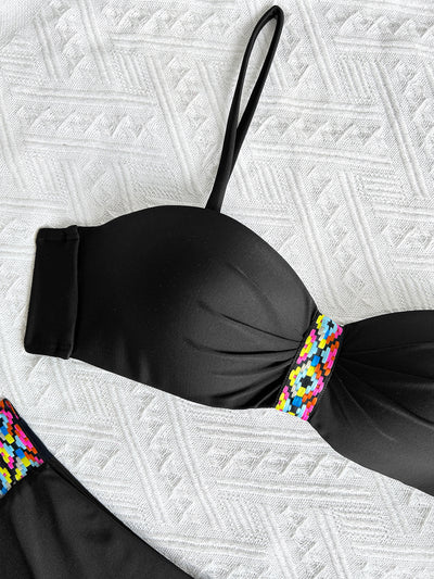 Black split bikini swimsuit for women with a bandeau top and high-cut bottom, featuring colorful geometric patterns. - Image 13