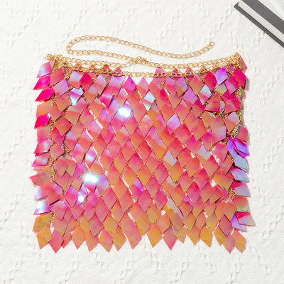 Woman wearing a gold-tone body chain top with iridescent pink and orange diamond-shaped sequins, perfect for beach or festival. - Image 25