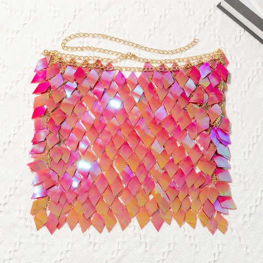 Woman wearing a gold-tone body chain top with iridescent pink and orange diamond-shaped sequins, perfect for beach or festival. - Image 25